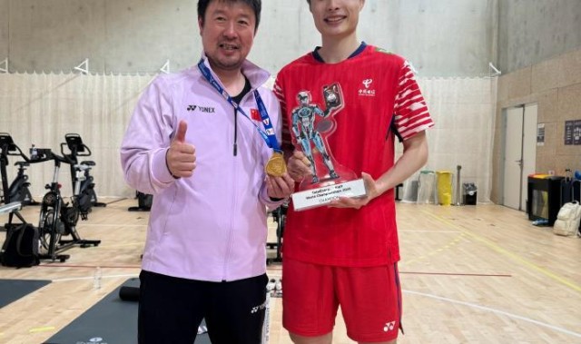 pg电子官网-羽协主席张军：石宇奇教练在决赛前吃速效救心丸上场指导